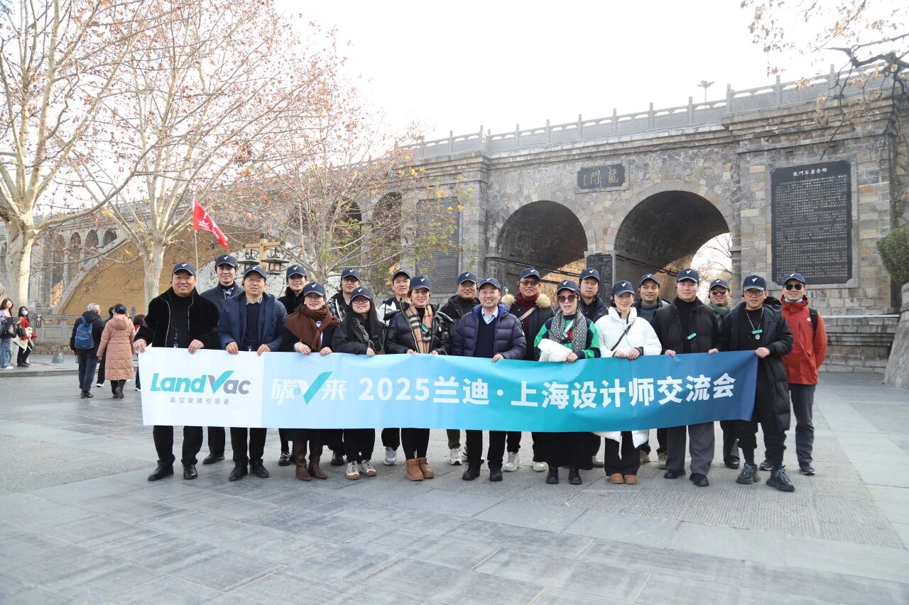 Close-up of LandVac titanium vacuum glass showing the high-tech sealing process during the designer factory tour1