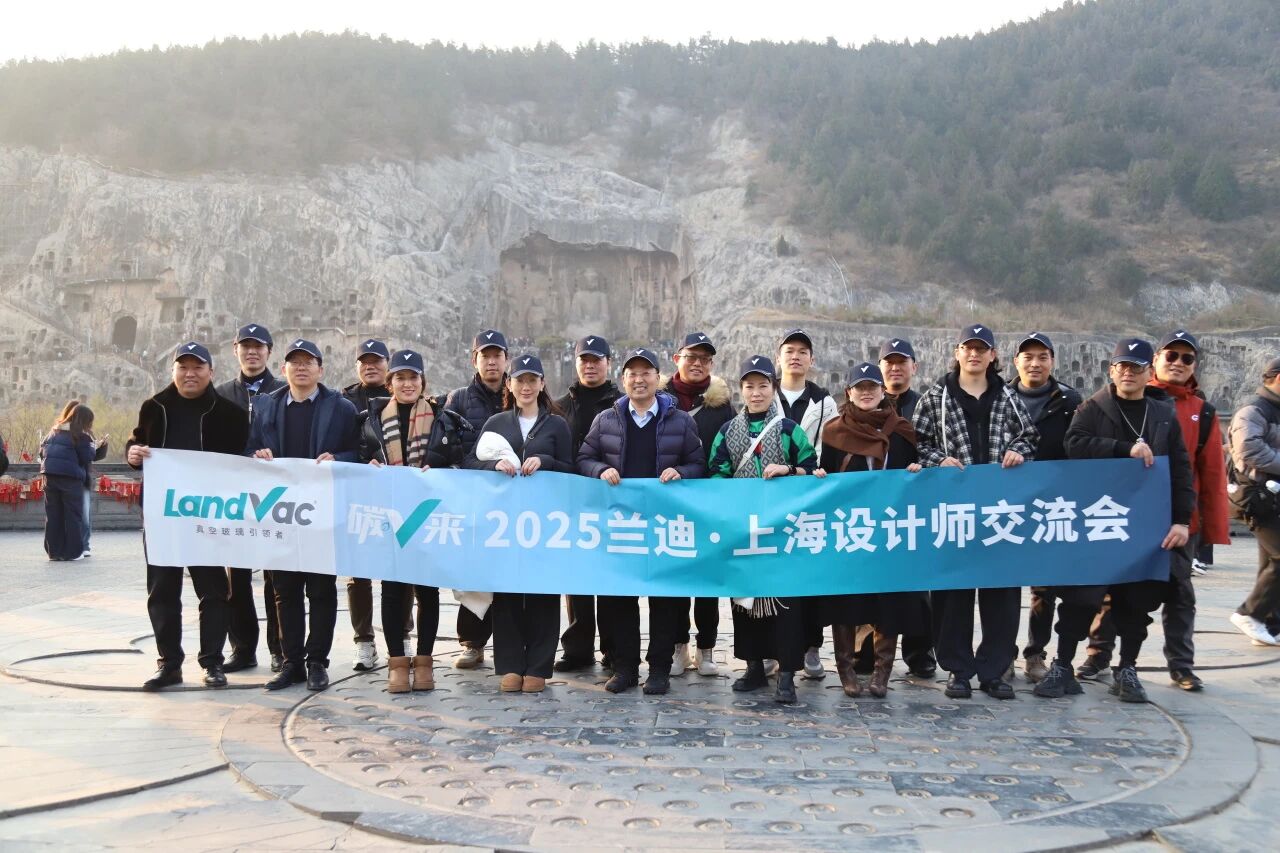 Group photo of LandVac team and Beijing-Shanghai design delegation at the Longmen Grottoes in Luoyang.1