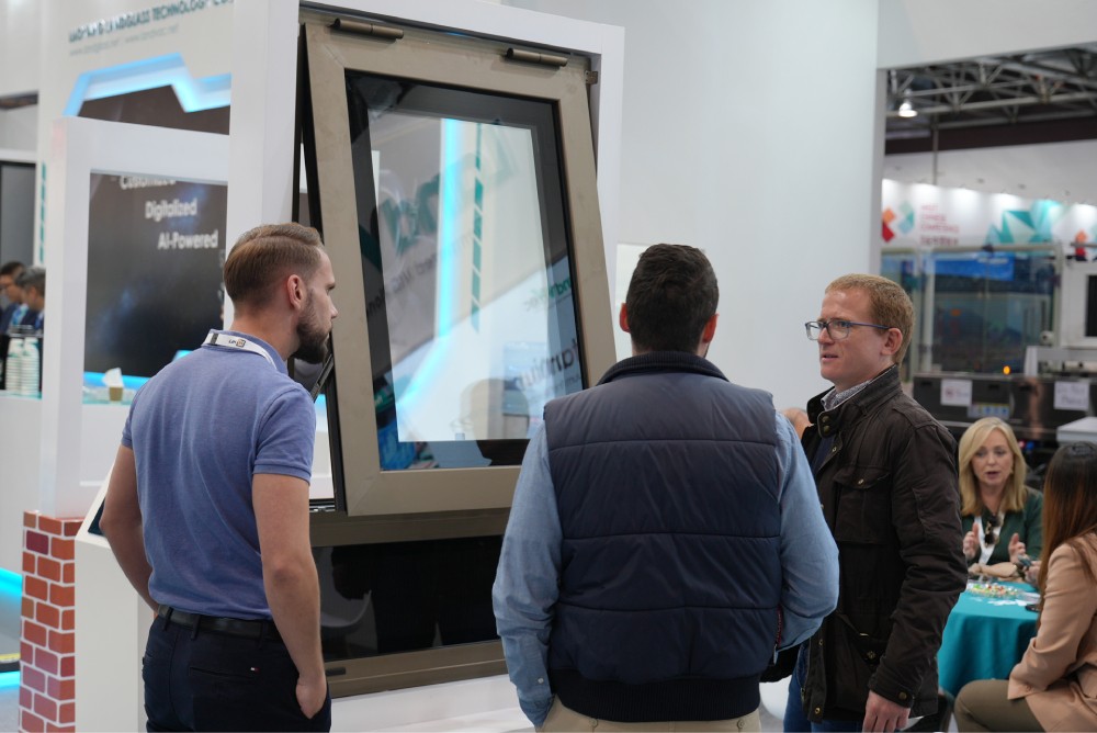Visitors viewing LandGlass products and technology demonstrations at the exhibition