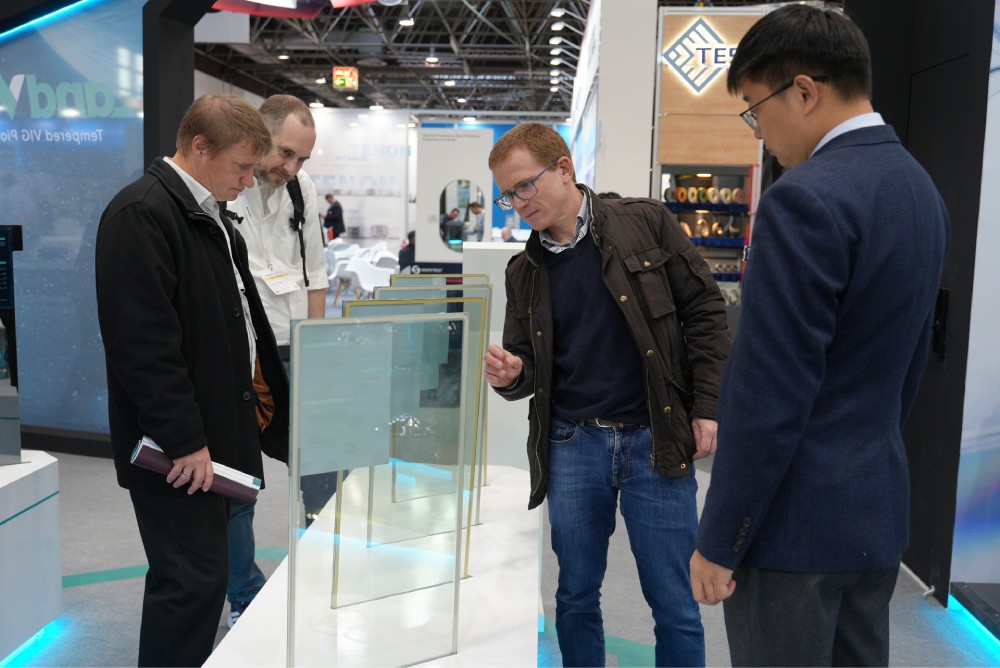 Industry professionals visiting the LandGlass booth at Glasstec 2026