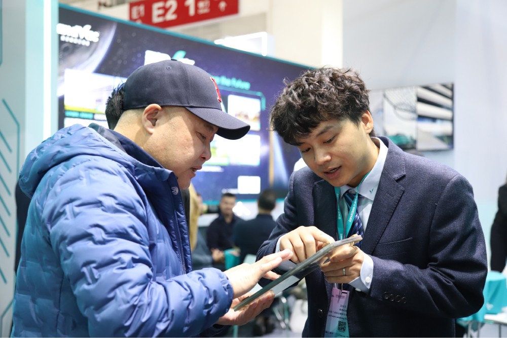 Visitors discovering LandVac vacuum insulated glass technology